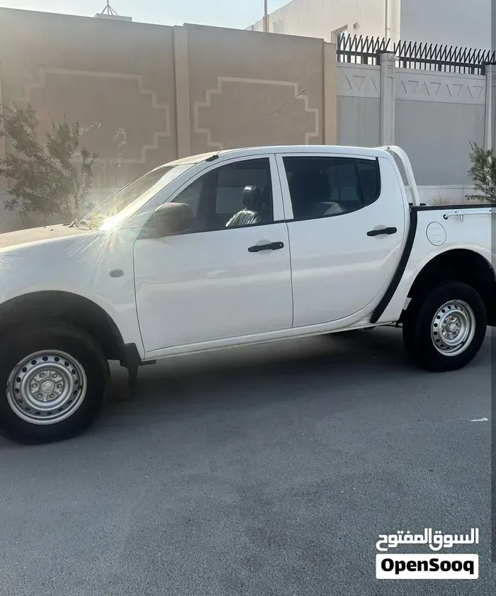 Mitsubishi L200 2015 photo 3