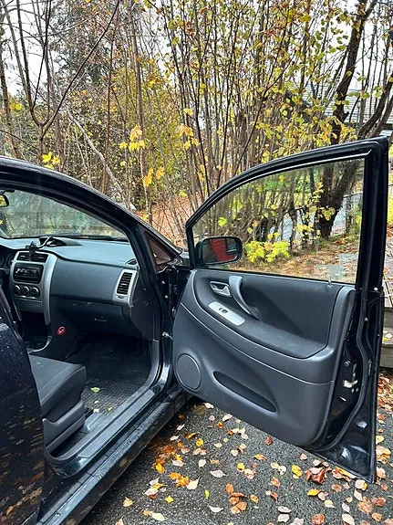 Suzuki Liana 2005 photo 2