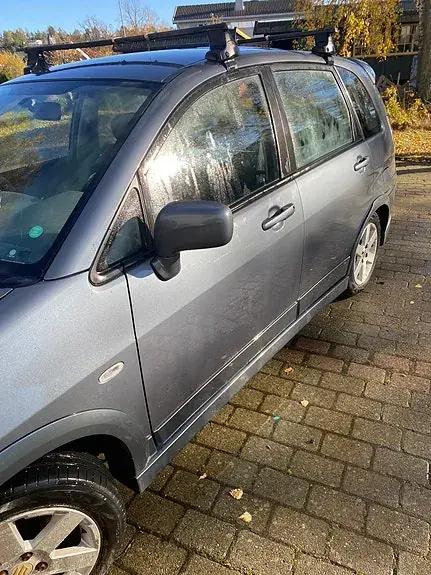 Suzuki Liana 2005 photo 4