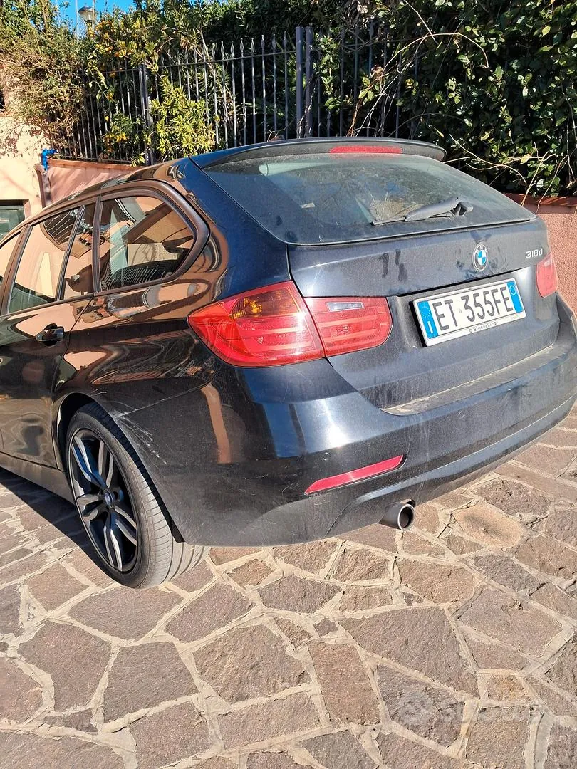 BMW 318 2013 photo 2