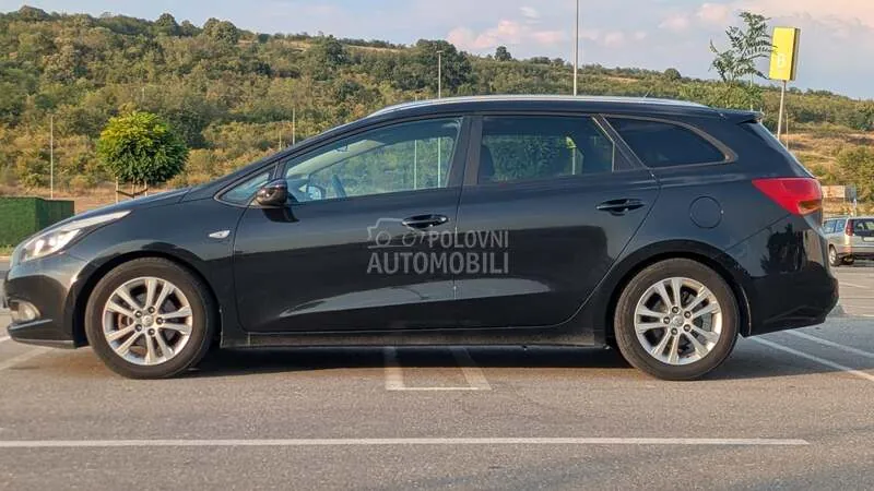 Kia Ceed Sw 2013 photo 2
