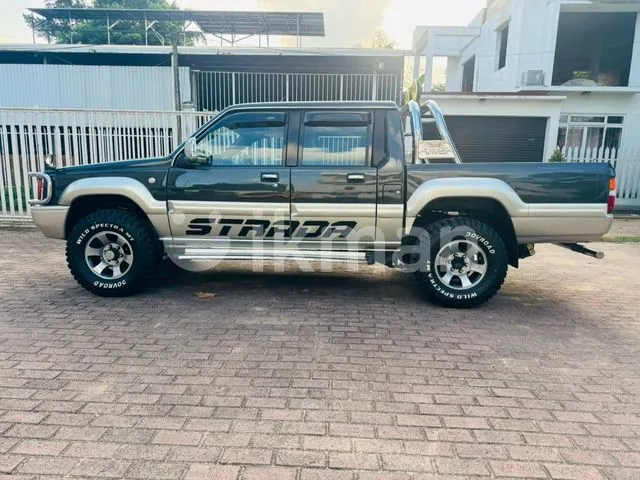 Mitsubishi Strada 1993 photo 3