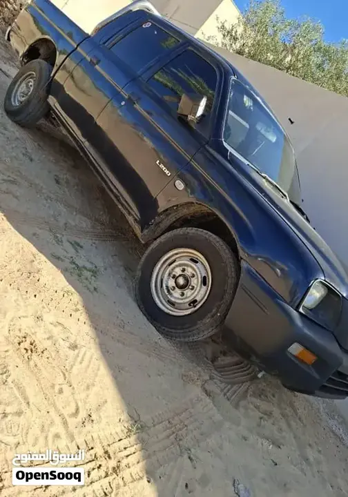 Mitsubishi L200 2004 photo 2