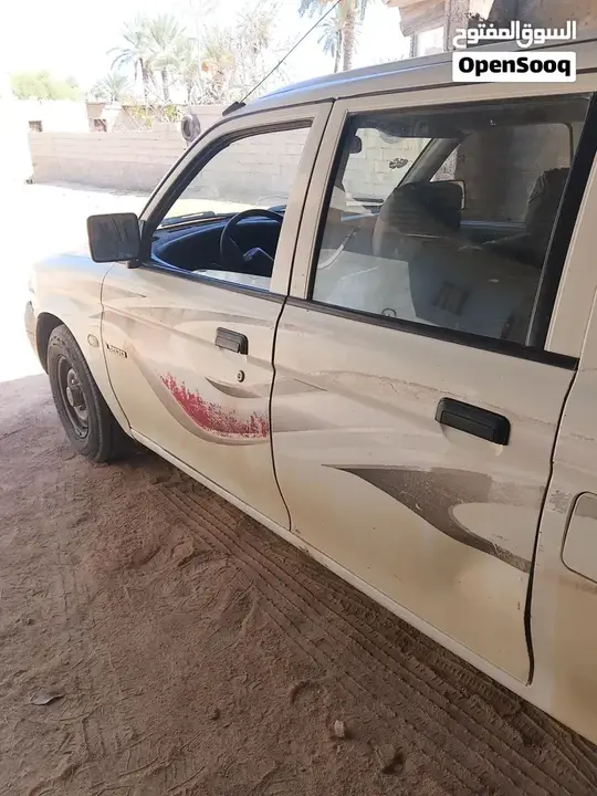 Mitsubishi L200 2004 photo 5