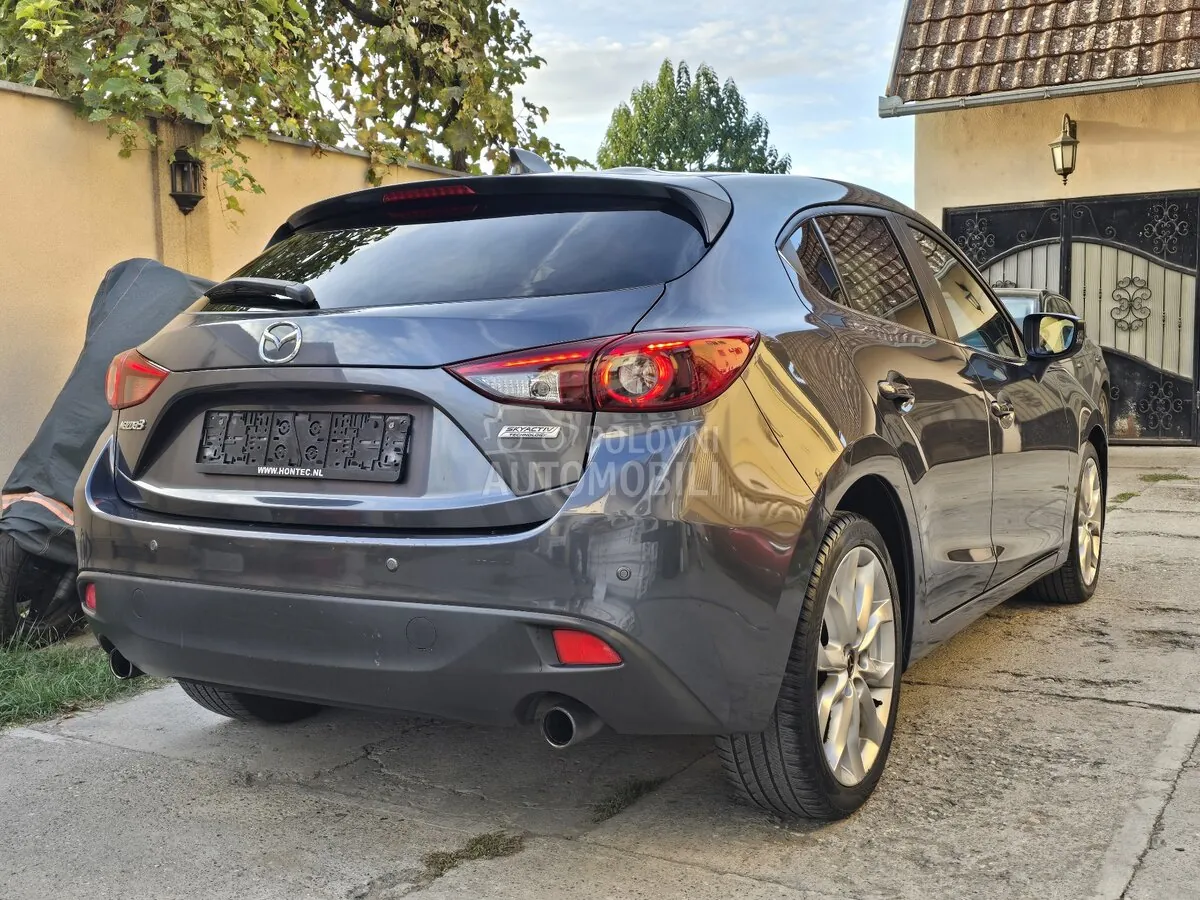 Mazda 3 2014 photo 4
