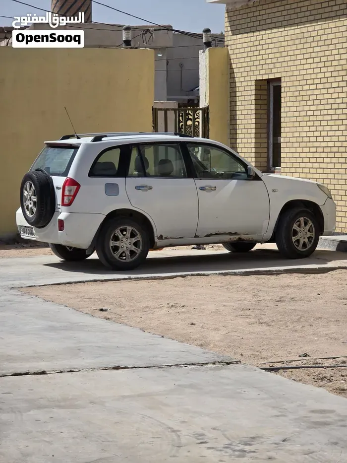 Chery Tiggo 2013 photo 4