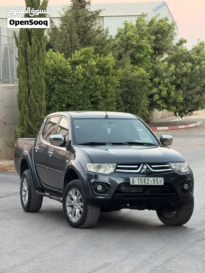 Mitsubishi L200 2014 photo 3