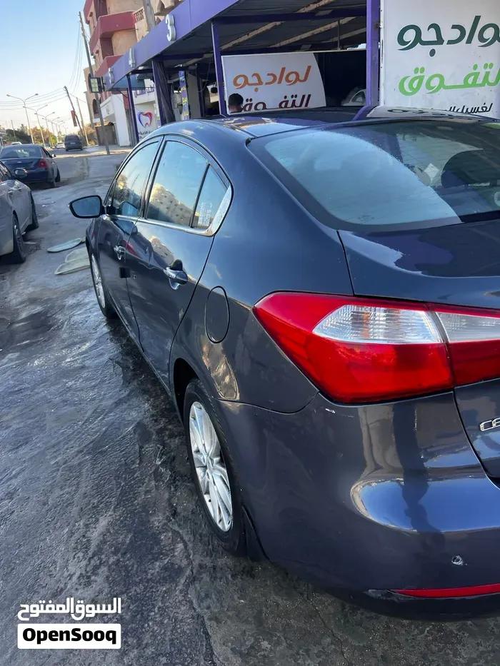 Kia K3 2014 photo 3