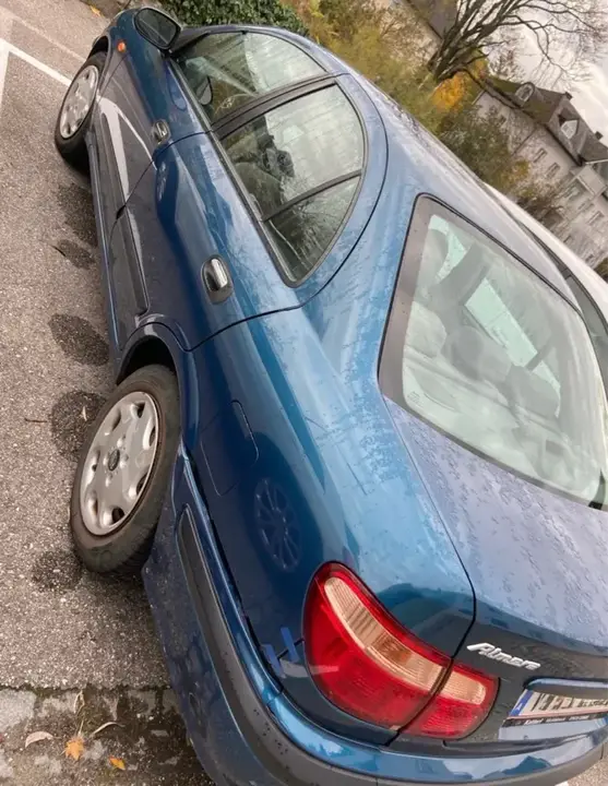 Nissan Almera 2002 photo 2