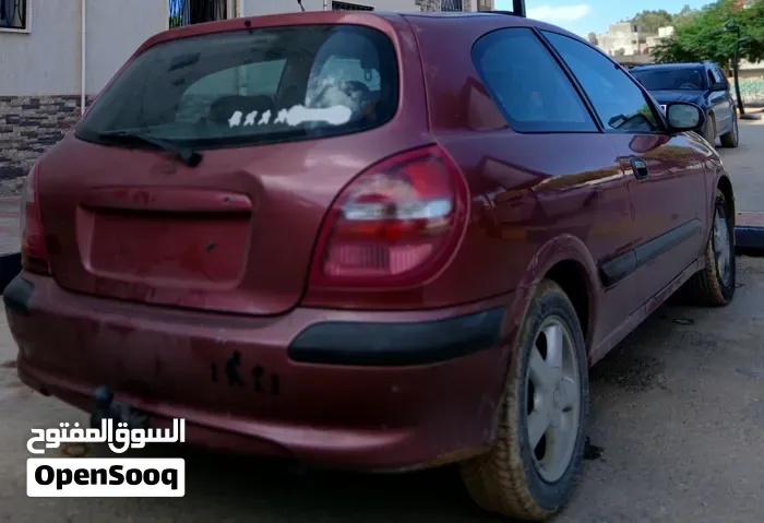 Nissan Almera 2003 photo 2