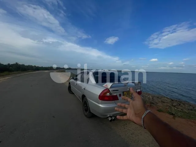Mitsubishi Lancer 1998 photo 4