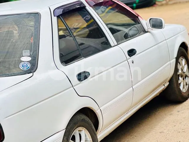Nissan Sunny 1996 photo 2