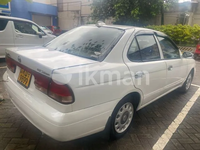 Nissan Sunny 2004 photo 3