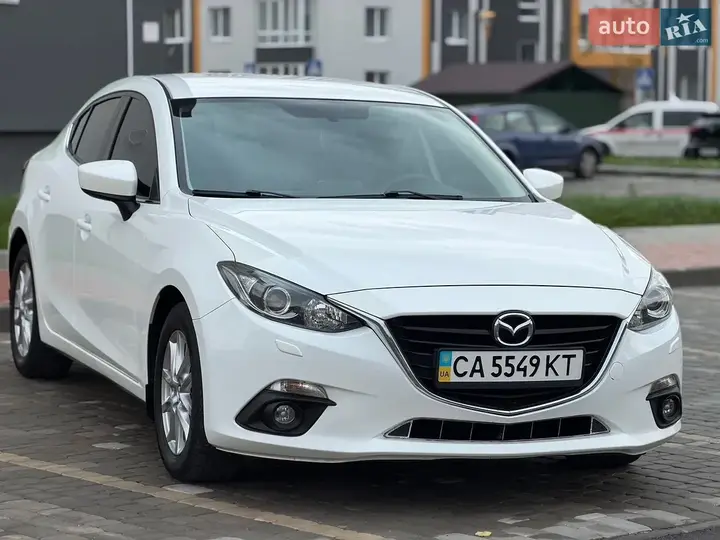 Mazda 3 2014 photo 4
