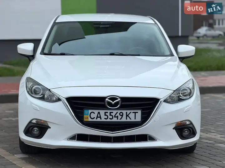 Mazda 3 2014 photo 2