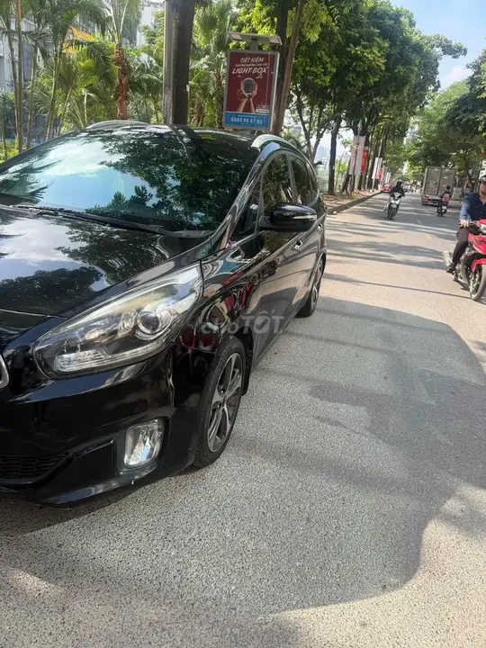 Kia Rondo 2014 photo 2