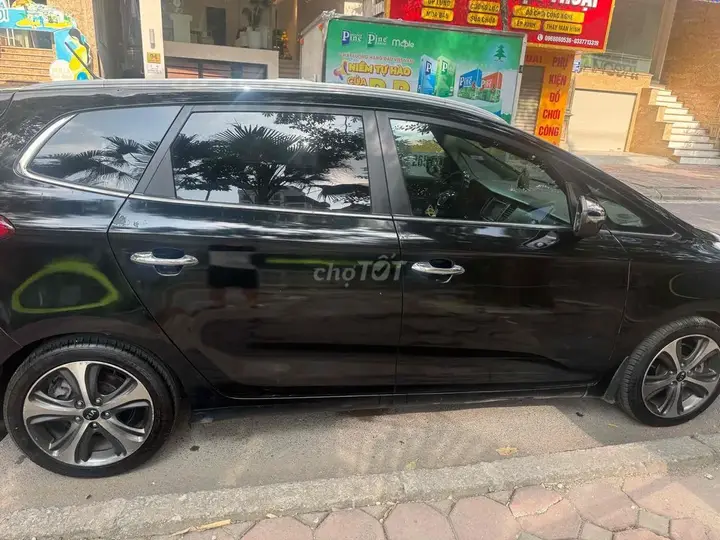 Kia Rondo 2014 photo 4