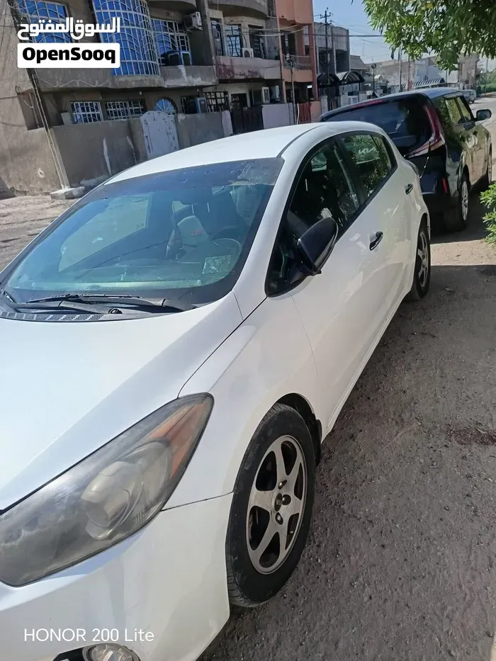 Kia Forte 2014 photo 2