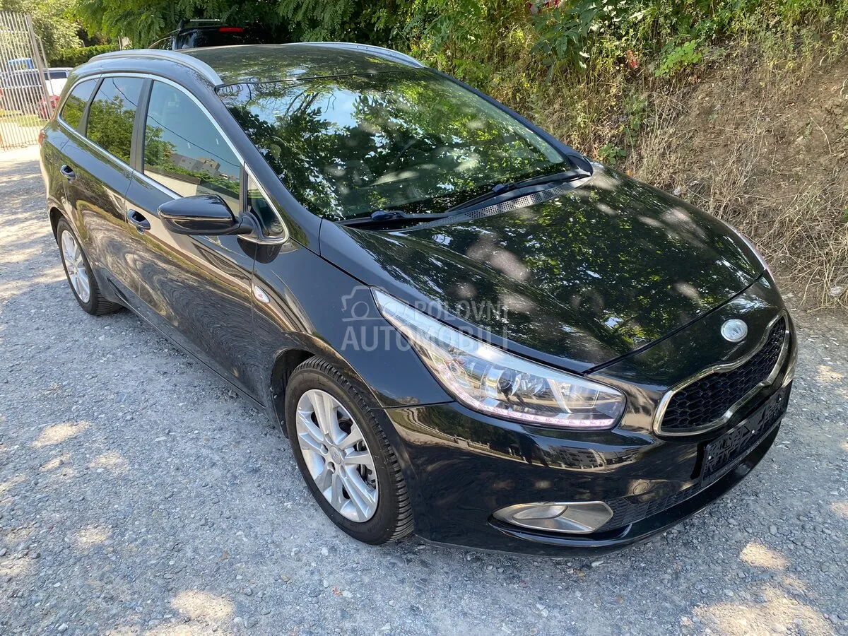 Kia Ceed Sw 2014 photo 2