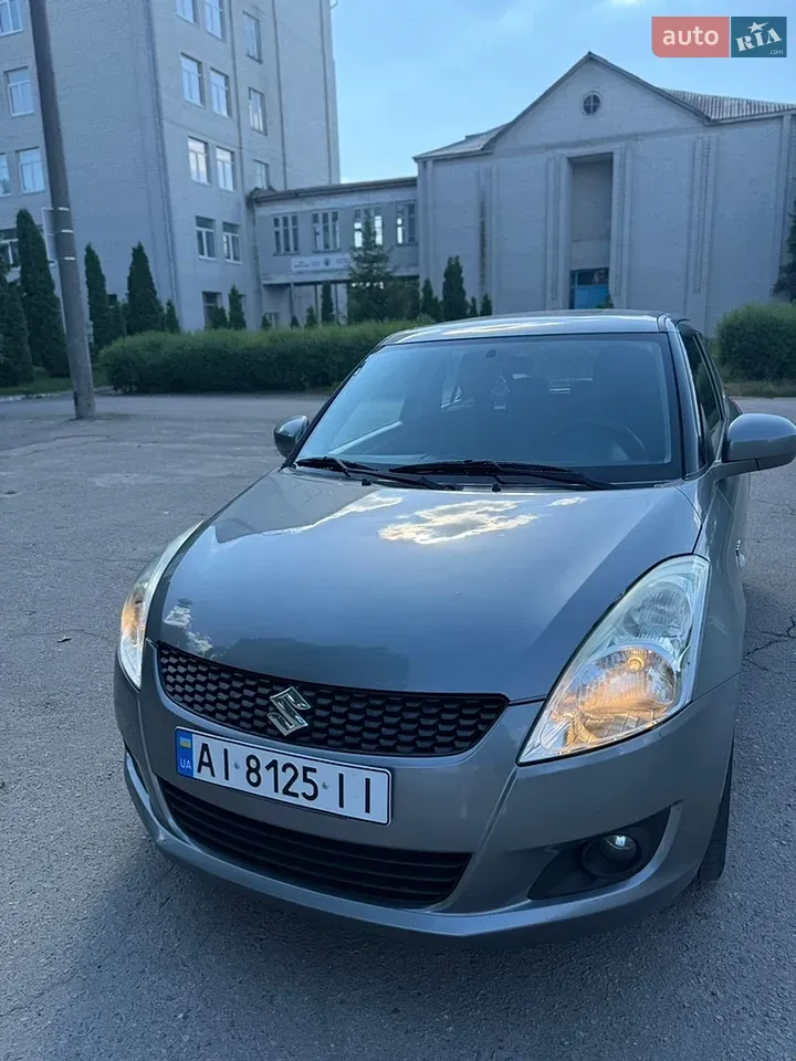 Suzuki Swift 2011 photo 2