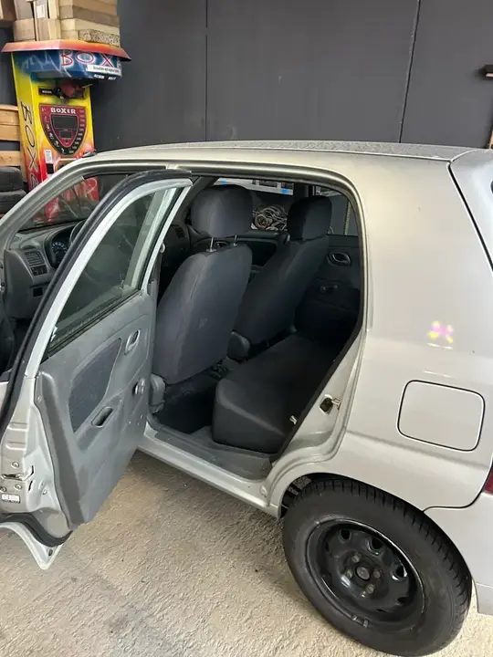 Suzuki Alto 2004 photo 2