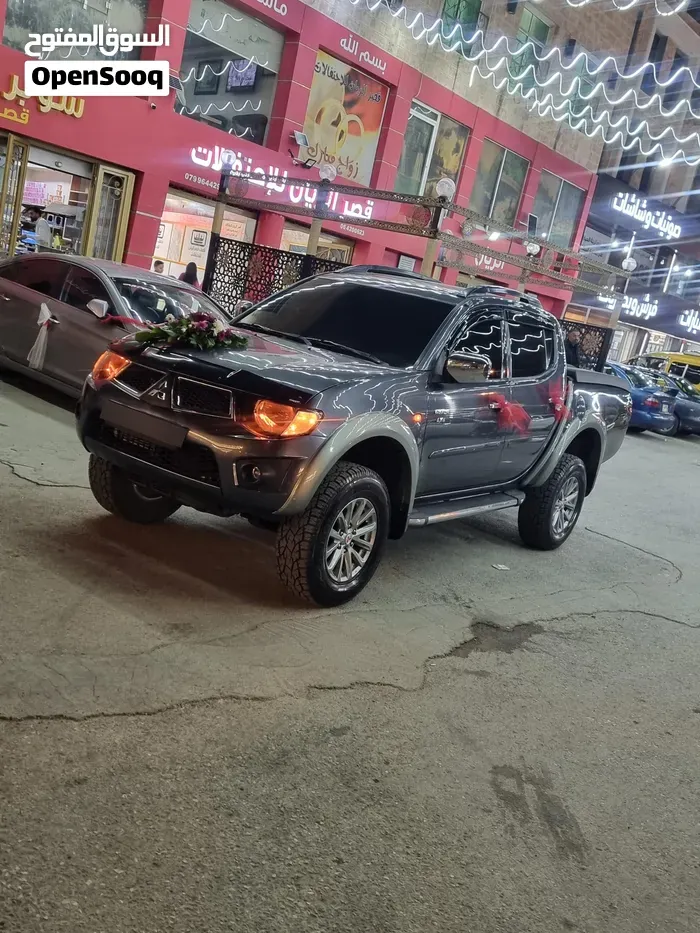 Mitsubishi L200 2009 photo 2