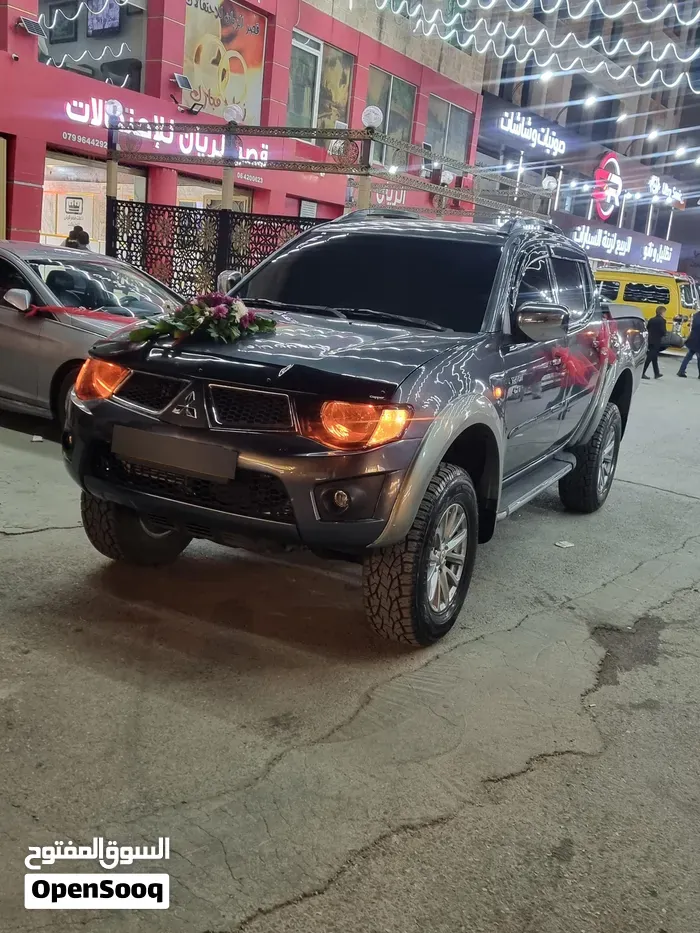 Mitsubishi L200 2009 photo 3