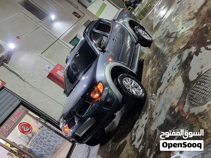 Mitsubishi L200 2009 photo 4