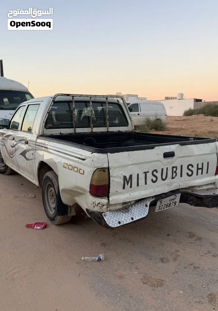 Mitsubishi L200 2004 photo 2