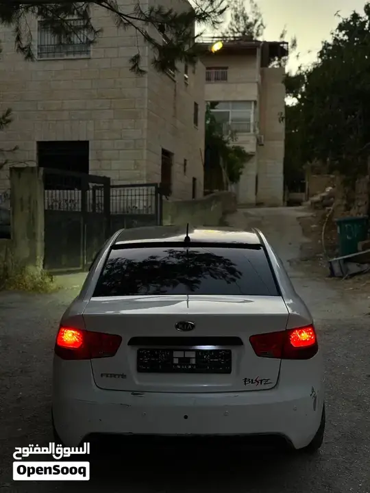 Kia Forte 2012 photo 2