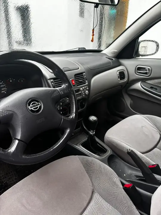 Nissan Almera 2001 photo 3