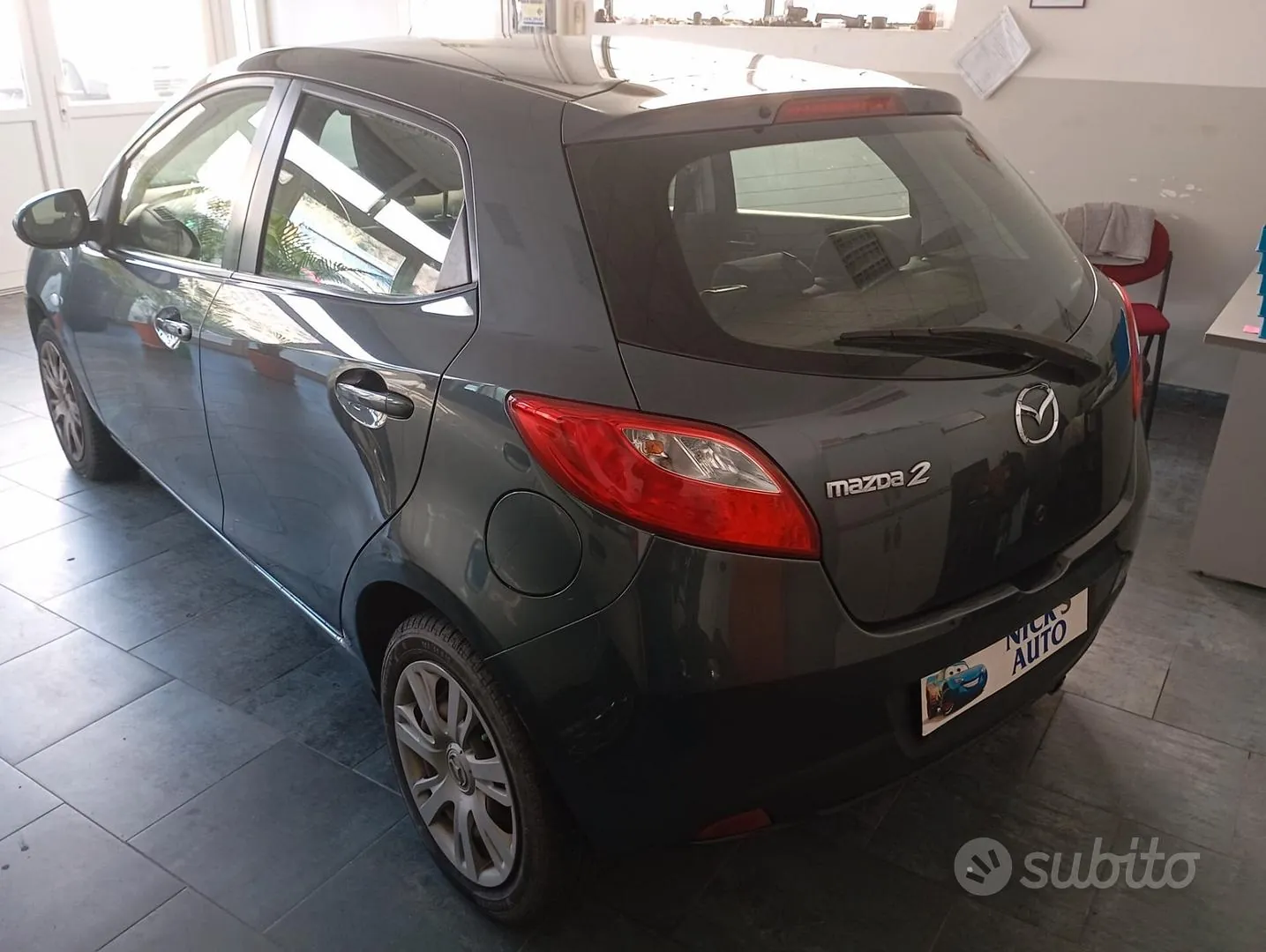 Mazda 2 2013 photo 3