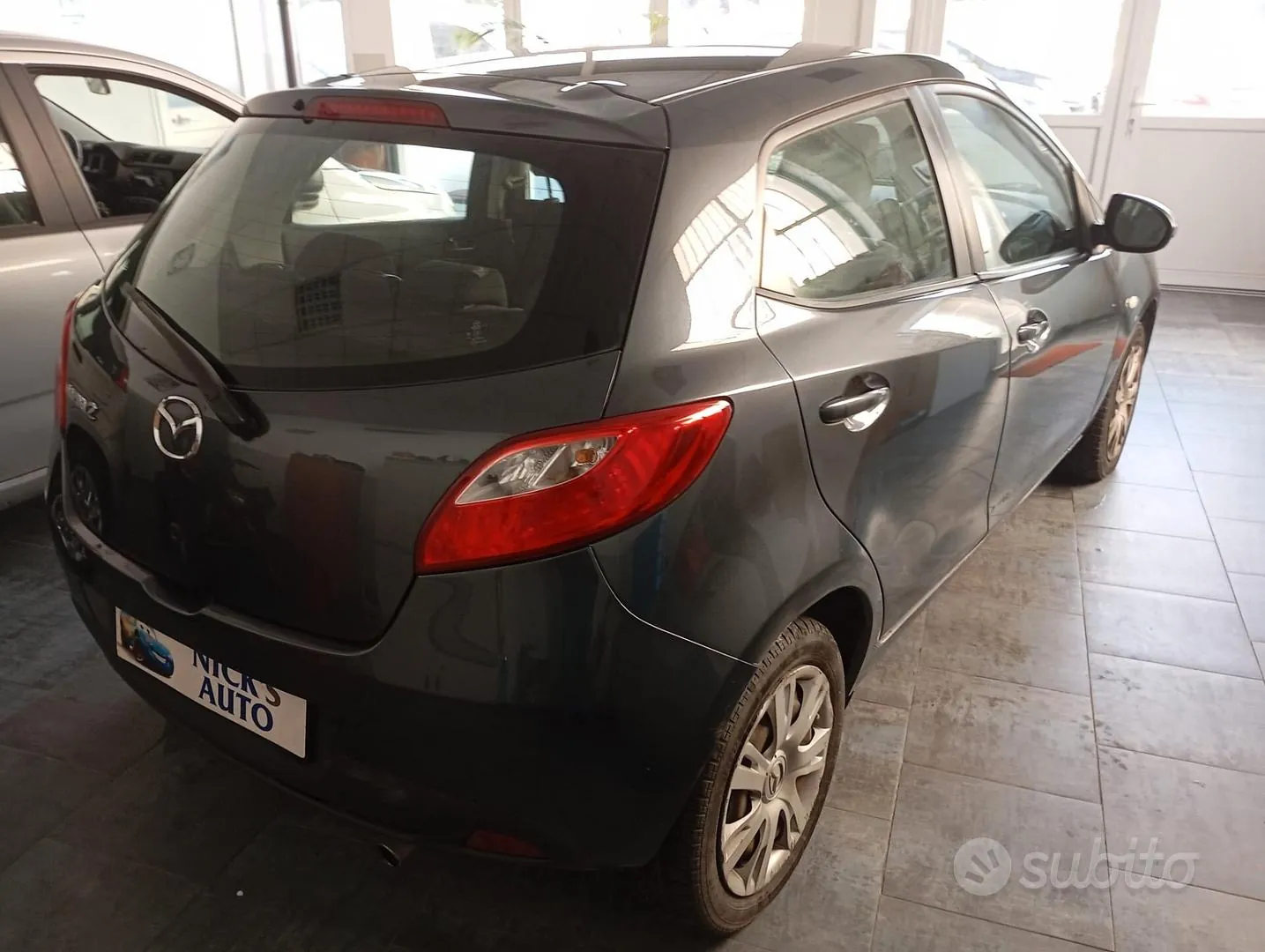 Mazda 2 2013 photo 4