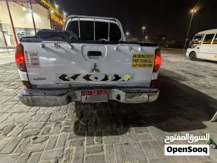 Mitsubishi L200 2015 photo 4