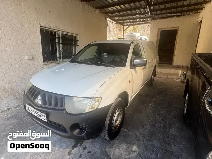 Mitsubishi L200 2006 photo 5