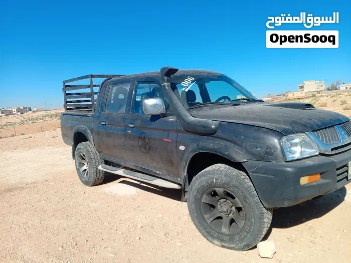 Mitsubishi L200 2006 photo 2