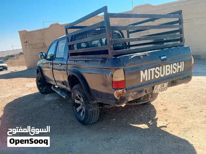 Mitsubishi L200 2006 photo 4
