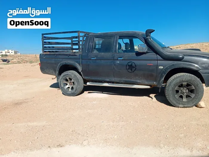Mitsubishi L200 2006 photo 3