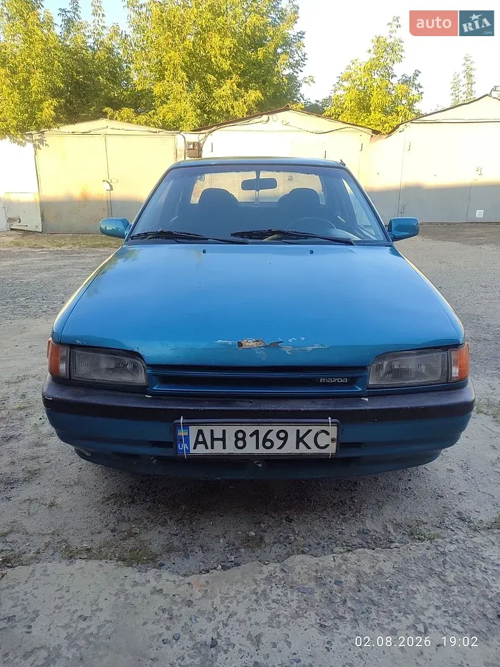 Mazda 323 1995 photo 3