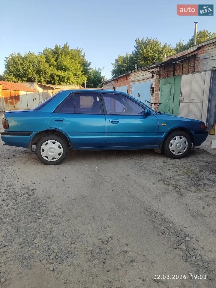 Mazda 323 1995 photo 2