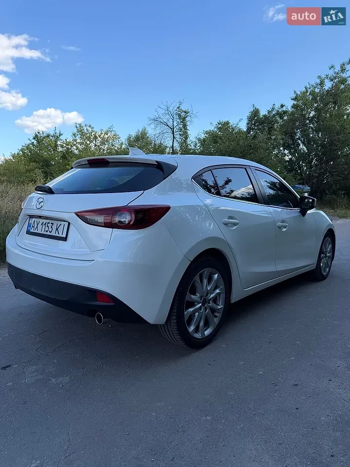 Mazda 3 2014 photo 4