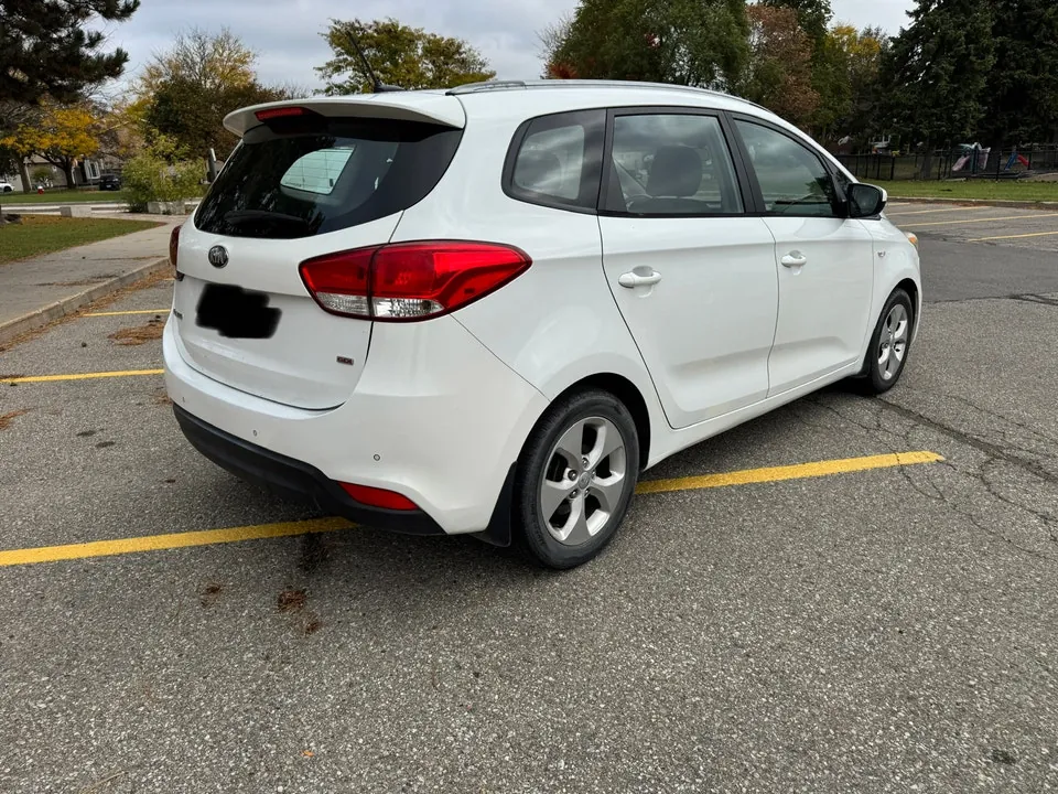 Kia Rondo 2014 photo 4