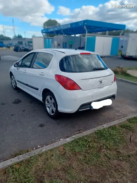 Peugeot 308 2012 photo 2