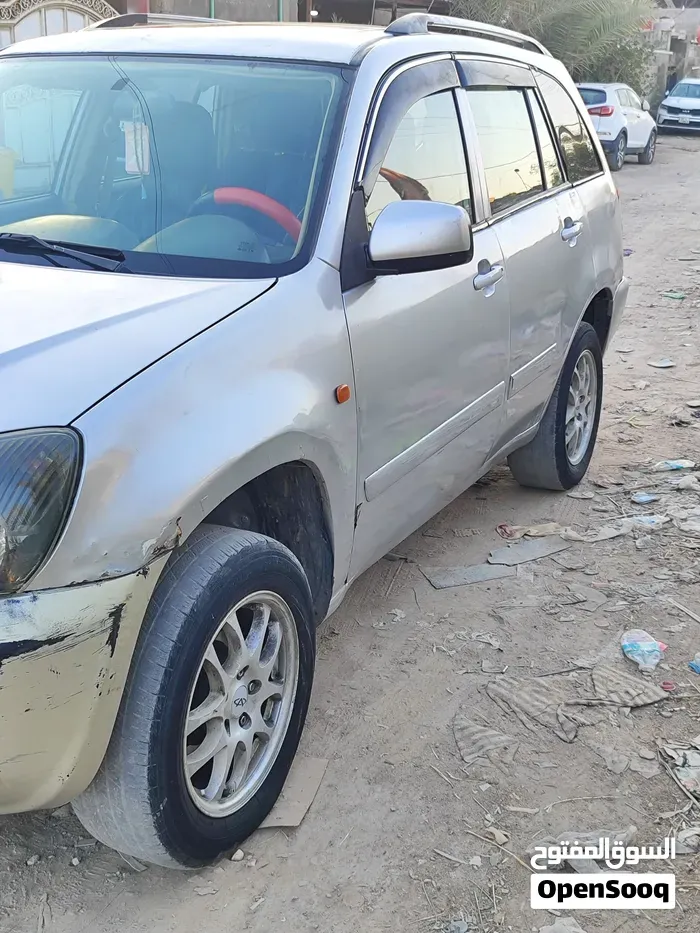 Chery Tiggo 2012 photo 3