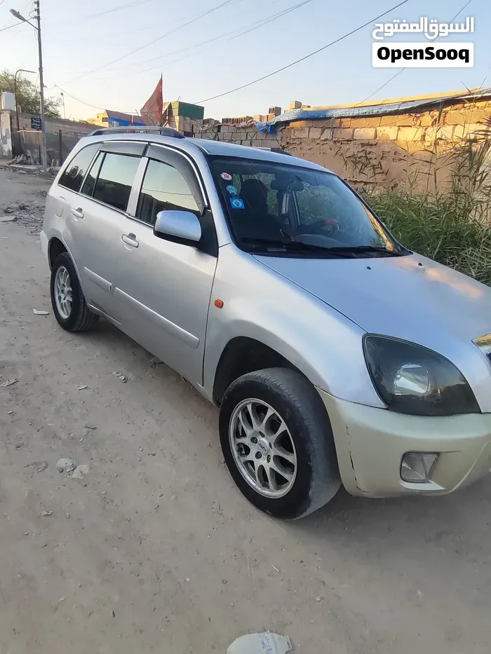 Chery Tiggo 2012 photo 4