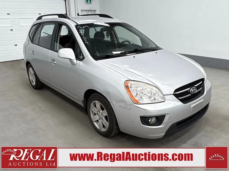 Kia Rondo 2009 photo 2