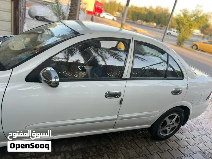 Nissan Sunny 2009 photo 4