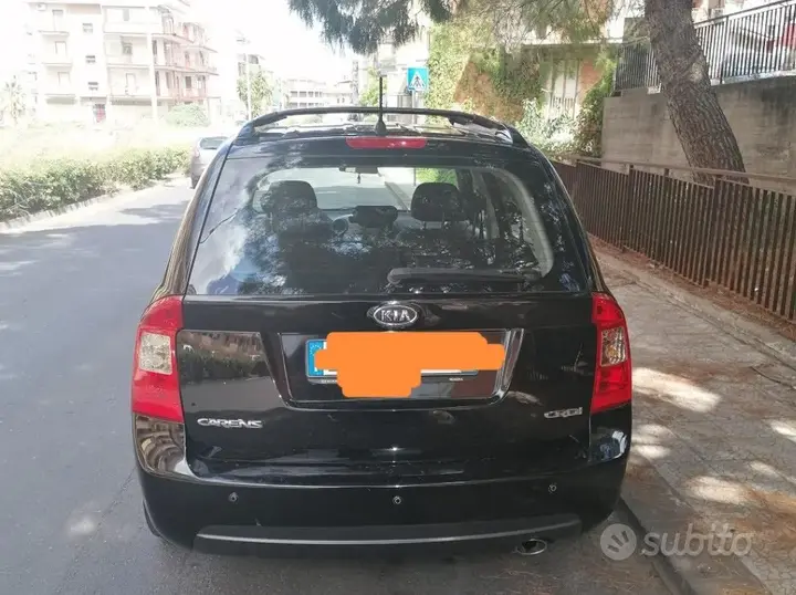 Kia Carens 2009 photo 2