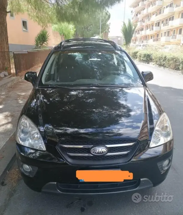 Kia Carens 2009 photo 4