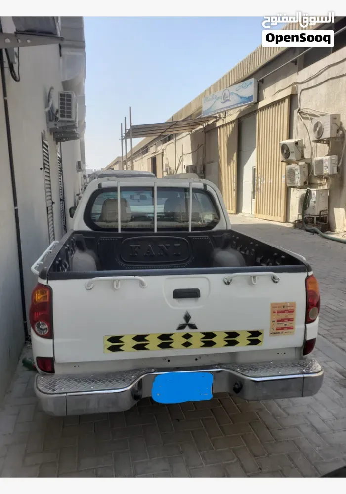 Mitsubishi L200 2011 photo 4